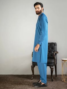 2 Piece Embroidered Cotton Suit (Kurta+Shalwar)Ban necklineGeometric pattern embroidery on the ban and placketWooden button closure on the placket and cuffsTwo side pocketsFull sleevesDyed shalwarColor: Teal BlueFabric (Kurta+Shalwar): CottonWeight: 460 gModel is wearing size "M"Code: P8918SK-XSS-TBL Care InstructionsWash light and bright colors separately. Do not bleach. Do not twist/wring, warm iron to sequined, beaded, and delicate fabrics. Do not dry in direct sunlight.DisclaimerActual color Wedding Branding, Pattern Embroidery, Formal Wedding, Sale House, Bright Colors, Women Girl, 2 Piece, Batik, Bleach