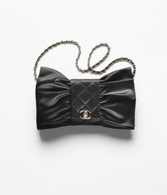 Clutch, Satin & gold-tone metal, black — Fashion | CHANEL Chanel Bow, Street Style Handbags, Chanel 2022, Chanel Party, Moda Chanel, Chanel Clutch, Mode Chanel, Chanel Store, Chanel Casual