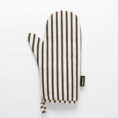 a oven mitt with black and white stripes