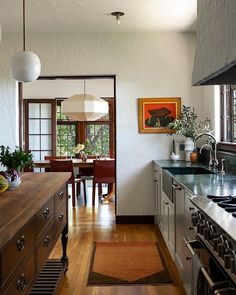 the kitchen is clean and ready to be used as a dining room or family room