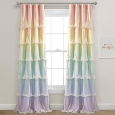 the curtains in this room are multicolored and have ruffles on them