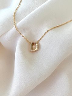 **Each piece in my shop, I personally create and photograph. (All photos are property of The Cord Gallery LLC) Thank you for supporting my small business. Tiny Gold Initial Necklace -  Gold Filled Now all Gold Filled - Waterproof! Add a personal touch to your accessories collection with this Dainty Gold Initial Necklace!  Features a 18k Gold Filled Mini Initial Letter. Each letter is 3D for added interest and texture and hangs seamlessly on your choice of Gold Filled Link or Gold Filled Box chai Necklace Initial Letter D, How To Photograph Necklaces, Wishlist Summer, Letter Necklace Initials, Letter Charm Necklace, Gold Initial Necklace, Dainty Initial Necklace, Letter Pendant Necklace, Initial Necklace Gold