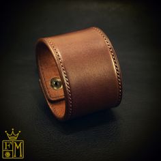 "This brown leather cuff bracelet uses beautiful bridle leather! The perimeter is handstitched in brown thread and the edges are beveled, slicked smooth and sealed. 2 high quality aged brass snaps provide the closure. I'll need your wrist size for this cuff. Instructions in the pics above! Can be made in Black bridle leather as well. Just ask! - 2\" wide - Rich brown bridle leather - Snap closure Thx! Freddie LIVE●LOVE♥LEATHER" Black Cuff Bracelet, Black Leather Cuff Bracelet, Leather Wrist Cuff, Leather Cuff Bracelet, Leather Wristbands, Wristband Bracelet, Leather Cuffs Bracelet, Wrist Cuffs, Leather Cuffs