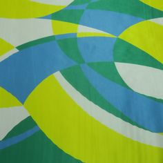 an abstract painting with blue, green and white circles