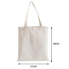 a white canvas tote bag with measurements for the size and width, on a white background