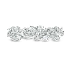 a white gold ring with diamonds in the center and leaves on each side, set against a