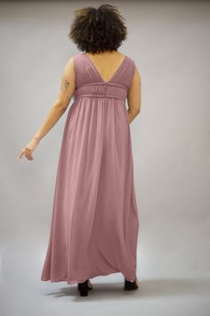 With a plunging neckline and empire waist, the Heyun dress has a flowing Grecian silhouette to bring out your inner goddess Full length chiffon dress with pleating and plunging neckline Fully lined with built-in cups for extra support. Model is 5’11" & wearing a size 16 *Our gowns may have a manufacturer's variation of +/- 1/2 inch in dress or length measurements. Camera resolution and monitors may cause colors to vary slightly between the photos and the actual fabric. Colors are subject to the Color Whisper, Dress With Pleats, Bridesmaid Dress Sizes, Inner Goddess, Home Dress, Dress Size Chart, Plunging Neckline, Empire Waist, Chiffon Dress