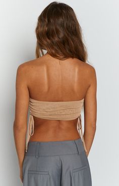 * Tan Mesh Strapless Top 
 * Your perfect bandeau staple! This is no ordinary strapless top, with its fine details this crop can dress up any casual look! Wear with pants () and sneakers () or go that step further with a cute mini skirt () and heels ()! 
 * Strapless top 
 * Cropped 
 * Bandeau style 
 * Adjustable rouching on either side 
 * Unlined - mesh material 
 * Light-weight with stretch Cute Mini Skirt, Prom Midi Dress, Skirt And Heels, Summer Playsuit, Its Fine, Semi Formal Dresses, Beginning Boutique, Sweater Crop, Long Crop Top