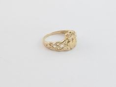 14k Solid Yellow Gold Irish Claddagh Ring!! Material: 14k gold , Not plated or filled Metal Purity: 14k gold , Stamped Ring weight: 2.4 grams Ring size: Available from size 5 to 8 Finish: Shiny puffed heart Complementary Gift Box Images may be enlarged to show detail and the item may look larger than it appears in person.In order to reduce buyer remorse and return please pay attention to the photos and read description to make sure about measurements such as size , thickness, and length before t Gold Stackable Rings Hallmarked 14k, Gold Heirloom Heart Ring In 14k Gold, Heirloom 14k Gold Heart Ring, 14k Gold Heart Ring In Fine Jewelry Style, Gold 14k Heart Ring In Fine Jewelry Style, Hallmarked Gold Heart Ring, Yellow Gold Round Heart Ring, Tarnish Resistant, Gold Hallmarked Heart Ring In Fine Jewelry Style, Gold Hallmarked Heart Ring Fine Jewelry