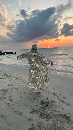 Burningman Outfit, Sparkly Kimono, Golden Outfit, Gold Sequin Kimono, Gold Caftan, Sequin Kimono, Sequin Duster, Party Outfit, Burner jacket  Bohemian Sun Catcher Kimono 🤍💿 Goldish Mirror like shell sequins duster with a hood 🪐🌪          ⚡️💥Want 3 days fast shipping? There is an option at the check out!☄️ 🪐 Crafted with very Bright Light Gold Sequins on Beige fabric. It is not a tacky gold instead it is a very classy hue of gold. Shell Shaped sequins are embroidered in tribal ethnical patt Golden Outfit, Sequin Duster, Bohemian Sun, Sequin Cape, Sequin Kimono, Edc Outfits, All White Outfit, Sequin Jacket, Gold Sequins