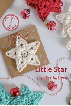 the little star crochet pattern is next to other christmas ornaments and decorations on a table