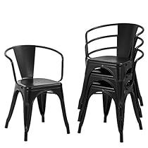 two black chairs sitting next to each other on top of a white background and one is empty