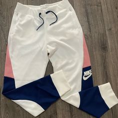 Nike Colorblock Joggers Nwot, Perfect Condition, No Tears/Flaws Drawstring Closure, 2 Pockets With Zippers, Pink And Blue Colorblock Women’s Size M Fitted White Bottoms With Patchwork Details, Casual White Bottoms With Patchwork, Casual White Patchwork Bottoms, White Patchwork Bottoms For Spring, Sporty White Color Block Bottoms, White Cotton Bottoms With Contrast Color, Fitted White Color Block Bottoms, White Color Block Sports Bottoms, White Color Block Bottoms For Sports