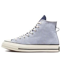 The Converse Chuck 70 High 'Washed Indigo Hickory Stripes' is a classic 1970s silhouette reimagined for today. Featuring a tapered toe and extra layers for added depth, this sneaker is perfect for everyday wear. The rubber sole provides comfort and durability, while the blue and white colorway adds a stylish touch. This sneaker is inspired by the original 1970s design and is sure to be a timeless classic. Whether you're running errands or going out for the night, the Converse Chuck 70 High is th Cute Converse, Men's Converse, Sneakers Converse, Fresh Shoes, Cute Sneakers, Converse Chuck 70, Shoe Inspo