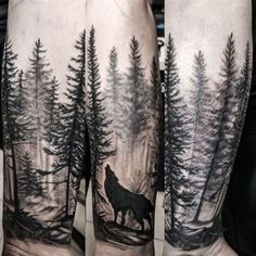 a man's arm with a wolf and trees tattoo on the back of his leg