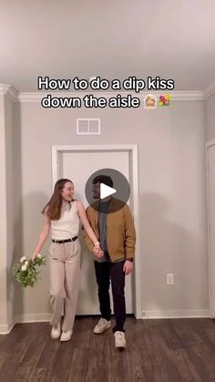 a man and woman holding hands standing in front of a door with the caption how to do a dip kiss down the aisle