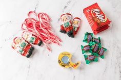 candy and candy canes laid out on a marble surface