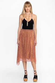 Crafted from a unique metallic fabric, Jillian Handkerchief Midi Skirt creates a delicate feminine silhouette. Featuring an elastic waist and sheer overskirt, this fully-lined skirt is finished with a flowing handkerchief hem. Pair with the Duffie Wrap Blouse and metallic heels and complete the look with a stunning clutch for a night out. Johnny Was Women's Jillian Handkerchief Midi Skirt in Metallic Melon Pink, Size Large Chic Metallic Flowy Skirt, Chic Flowy Metallic Skirt, Glamorous Spring Pleated Skirt, Metallic Skirt For Summer, Metallic Summer Skirt, Elegant Metallic Midi Skirt, Metallic Stretch Skirt For Summer, Metallic Lined Skirt For Summer, Summer Metallic Stretch Skirt