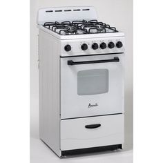 a white stove top oven sitting on top of a counter