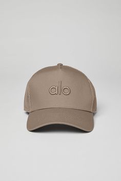 The elevated version of your classic cap, our District Trucker Hat has an Alo embroidered logo and mesh back with adjustable snap closure. Embroidered logo patch Mesh detail Adjustable snap back closure Alo Hat, Trucker Hat Outfit, Branding Clothing, Sweatpants And Sweater, Gray Accessories, Luxury Hats, Ballet Pink, Fabric Sale, Beach Hat