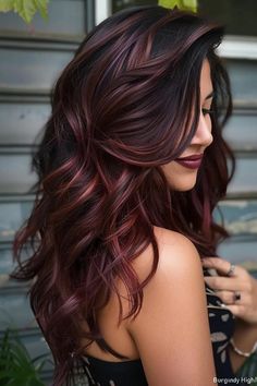 Burgundy highlights add a deep, rich red tone that’s perfect for a bold, vibrant look. Red Hair With Burgundy Highlights, Brown To Burgundy Hair, Brown Blonde Burgundy Hair, Dark Brown Red Hair With Highlights, Trendy Fall Hair Color For Brunettes, Burgundy And Blonde Highlights, Fall Color Highlights Brunettes, Fall Hair One Color, Brown With Red