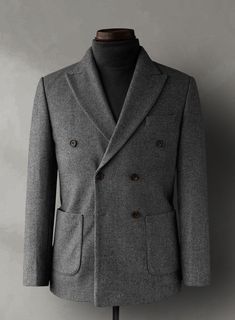 Create your own ideal style, making it unique for yourself and identifiable for others with our Gray Heavy Tweed Jacket. Crafted from pure wool, the gray shade has a very friendly vibe and is a definite keeper for all your important occasions. 
 
Look Includes   Gray Heavy Tweed Fabric  Double Breasted Jacket Style   Wide Peak Lapel (3.75")    Faux Horn Brown  Buttons  Double Vent  Four Cuff Buttons    Click 'Customize Now' to modify the look if needed.  
 
Lining: Viscose; Dry Clean. Gray Wool Blazer For Semi-formal Occasions, Gray Wool Outerwear With Double Button Closure, Winter Gray Blazer With Double Button Closure, Business Casual Wool Tweed Jacket With Double Button, Wool Double-breasted Sport Coat, Wool Tweed Jacket With Double Button For Business Casual, Gray Wool Outerwear With Welt Pockets, Tailored Double-breasted Gray Outerwear, Tailored Gray Double-breasted Outerwear