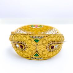 Ornate Regal 22k Gold Stone Cuff Gold Fusion Bangle For Formal Occasions, Gold Fusion Bangle For Ceremonial Occasions, Temple Jewelry Bangle With Intricate Design For Formal Occasions, Traditional Jeweled Yellow Gold Bangle, Traditional Yellow Gold Jeweled Bangle, Gold Jeweled Fusion Bangle, Gold Fusion Style Jeweled Bangle, Heavy Fusion Bangle For Ceremonial Occasions, Festive Jeweled Bangle For Formal Occasions