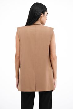 Our Selena Vest is an investment piece that promises a high return in style. Inspired by our Norah Blazer, Selena’s relaxed, sleeveless fit from lightweight European polyviscose features a lapel collar, double welt pockets, and a slit at the back. She's fully lined with padded shoulders and double-breasted fastening for structure and versatility, bringing a feminine touch to the enduring charm of a menswear-inspired classic. | Yada, in off white and in raspberry, is 5'9" (175 cm) tall, wearing s White Raspberry, Sleeveless Blazer, Tunic Hoodie, Vest Outfits, Menswear Inspired, Sleeveless Vest, Lapel Collar, Welt Pockets, Tunic Dress