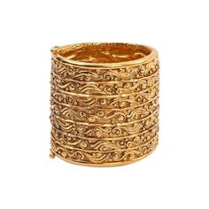 Chanel- (Made in France) Cuff bracelet composed of gilded metal. Additional information: Dimensions: Circumference: 17 cm (6.69") Opening: 3.5 cm (1.37") Height: 6 cm (2.36") Condition: Very good condition Seller Ref number: BRAB238 Antique Gold Cuff Bracelet For Formal Occasions, Vintage Gold Cuff Bracelet With Jubilee Design, Vintage Gold Jubilee Cuff Bracelet, Gold Ornate Brass Cuff Bracelet, Gold Engraved Cuff Bangle, Engraved Gold Cuff Bangle, Vintage Gold-tone Bangle Bracelet, Vintage Gold Cuff Jewelry, Vintage Gold Brass Cuff Bracelet