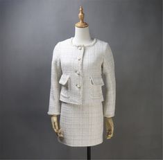 Introducing our Women's Custom Made Beige Checked Pattern Tweed Blazer Coat and Skirt Suit - a timeless ensemble crafted for weddings, speech days, graduations, and the perfect personalized gift. 🌟 Tailored to Perfection: Each piece is meticulously crafted to your measurements, ensuring a tailored fit that accentuates your elegance. Revel in the luxury of a personalized suit that reflects your individual style. 🌸 Classic Checked Pattern: The beige checked tweed pattern adds a touch of classic charm to this ensemble, creating a look that is both stylish and sophisticated. Embrace timeless elegance for special occasions. 👚 Versatile Blazer Coat: The blazer coat serves as a versatile piece that can be dressed up or down. Whether you're attending a wedding, a speech day, or a graduation cer Tweed Skirt Suit, Suit For Wedding, Womens Skirt Suits, Coat Skirt, Tweed Pattern, Womens Suits, Wedding Speech, Service Women, Tweed Suits