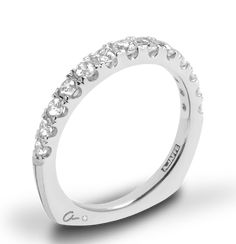 a white gold wedding band with round cut diamonds