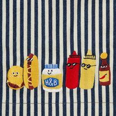 embroidered hot dogs, hamburgers and ketchup on a striped shirt