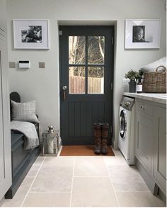 an instagram photo of a house by the bridge with a black door and window