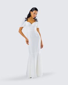 Be everything they’ve ever dreamed of in this classy white dress ☁️ Made from crepe fabric and complete with puff sleeves, this statement piece will have everyone falling in love with more than just the thought of you 🤍 White Puff Sleeve Dress With Ruffles For Evening, Elegant Puff Sleeve Dress With Fitted Bodice For Bridesmaids, Feminine Puff Sleeve Dress With Sweetheart Neckline For Evening, Fitted Puff Sleeve Maxi Dress For Date Night, Fitted Maxi Dress With Balloon Sleeves For Evening, Feminine Puff Sleeve Dress With Fitted Bodice For Evening, Fitted Balloon Sleeve Maxi Dress For Evening, Elegant Fitted Maxi Dress With Balloon Sleeves, White Midi Dress With Fitted Bodice And Short Sleeves