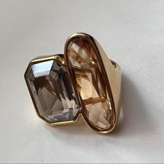 Used Swarovski Crystal Cocktail Ring In Gold Toi Et Moi Style Ring, You And Me Style Ring Swarovski Size 52 Usa Size 6/S Ring Only. Does Not Come With Original Packaging. Minor Scratches And Tarnishing. Final Sale. No Trades. No Returns. Toi Et Moi Ring Bezel, Elegant Crystal Ring With Stones For Formal Occasions, Elegant Gold Crystal Ring With Stones, Formal Crystal Rings With Stones, Elegant Faceted Crystal Ring For Anniversary, Luxury Faceted Crystal Ring Gift, Luxury Faceted Crystal Ring For Gift, Luxury Faceted Crystal Ring For Anniversary, Elegant Faceted Open Crystal Ring