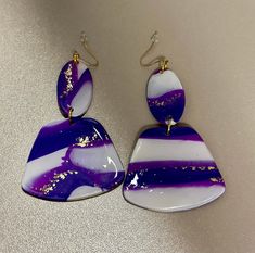 Purple,white and gold polymer clay earrings Unique Hand Painted White Earrings, Hand Painted Gold Polymer Clay Earrings, Hand Painted White Drop Earrings, Gold Dangle Earrings In Polymer Clay, Gold Polymer Clay Dangle Earrings, White Hand Painted Drop Earrings, Unique White Polymer Clay Earrings, Hand Painted White Earrings As A Gift, White Hand Painted Earrings For Gift