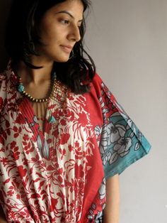 I made this Kaftan from a beautiful Red floral 100% mulmul cotton. Mulmul is a very fine variety of cotton which is extremely soft and it gets softer with every wash. It is so free flowing, that it will make you feel as if you aren't wearing anything at all ;) The beauty of the Kaftans is they will fit everyone so no need to worry about the size et all. All my Kaftans have deep necks(11-12 inches) so will fit all head sizes. However, the length of my kaftans will vary. It is 53 inches long and i Hostess Gown, Free Flowing, Vintage Style Dresses, 70s Inspired, Beach Covers, Red Floral, Red Green, Floral Tops, Kimono Top