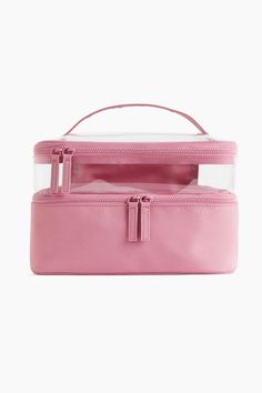 Spacious  practical  two-tiered toiletry bag with a handle at top. Two large compartments with two-way zippers around all sides. Height 6 in. Depth 6 1/4 in. Length approx. 9 3/4 in. Big Makeup Bags, Wash Bag, In Depth, Cosmetic Case, Wash Bags, Bag Set, Toiletry Bag, Pink Bag, Large Bags