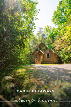 the cabin getaways at almost heaven is surrounded by lush green trees and foliage