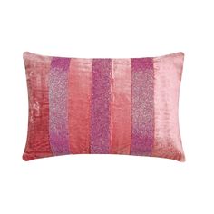 a pink and purple striped pillow on a white background