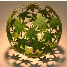 an image of a paper ball with leaves on it and the word interest above it