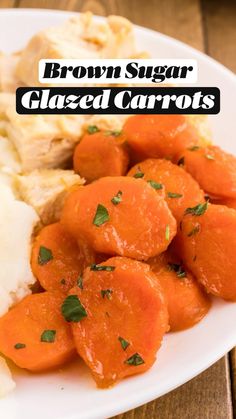 a white plate topped with carrots next to mashed potatoes