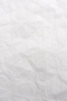 a white sheet of paper that has been wrinkled over