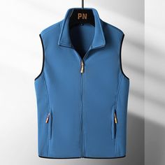 Season:Fall  Winter; Fabric:Polyester; Sleeve Length:Sleeveless; Gender:Men's; Style:Basic,Casual,Sport; Occasion:Daily Wear,Going out,Festival; Placket:Zipper; Fit Type:Regular Fit; Function:Warm; Pattern:Solid Colored; Design:Zipper,Pocket; Neckline:Standing Collar; Outerwear Type:Polar Fleece,Gilet,Fleece Vest; Listing Date:10/21/2022; Bust:; Length:; Shoulder Width: Outdoor Activities Vest With Zipper Closure, Sleeveless Vest With Zipper For Outdoor Activities, Sleeveless Outerwear With Zipper For Outdoor Activities, Blue Sleeveless Vest For Outdoor Activities, Men's Fleece Vest, Mens Fleece Vest, Fleece Gilet, Fishing Jacket, Gilet Long