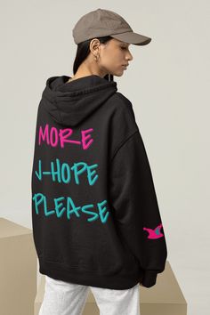 We just can't get enough of J-Hope. More J-Hope please! This hoodie comes with a statement back design and a subtle Jack in the Box inspired detail on the right sleeve. Perfect for every BTS J Hope stan.  * 50% pre-shrunk cotton, 50% polyester * Fabric weight: 8.0 oz/yd² (271.25 g/m²) * Air-jet spun yarn with a soft feel and reduced pilling * Double-lined hood with matching drawcord * Quarter-turned body to avoid crease down the middle * 1 × 1 athletic rib-knit cuffs and waistband with spandex * Front pouch pocket * Double-needle stitched collar, shoulders, armholes, cuffs, and hem This product is made especially for you as soon as you place an order, which is why it takes us a bit longer to deliver it to you. Making products on demand instead of in bulk helps reduce overproduction, so tha Kpop Hooded Sweatshirt For Winter, Kpop Hoodie With Letter Print For Winter, Kpop Hooded Sweatshirt With Letter Print, Black Kpop Sweatshirt For Streetwear, Kpop Style Black Sweatshirt For Streetwear, Kpop Style Winter Streetwear Sweatshirt, Kpop Hoodie With Letter Print For Fall, Kpop Style Hoodie With Letter Print For Fall, Kpop Style Hooded Hoodie For Streetwear