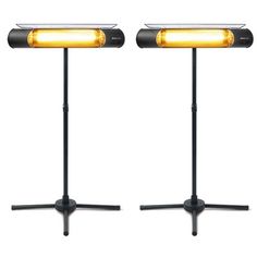 two black lamps with yellow lights on each side and one is turned on the other