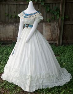 Muslin ballgown c.1865/6 shown with a bertha c.1865/6, belt with buckle c.1865 and mirrored fan c.1860s 1865 Fashion, Belt With Buckle, Edwardian Dress, History Fashion