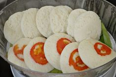 several slices of bread with tomatoes in a bowl