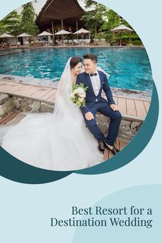 a bride and groom sitting next to a pool