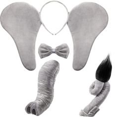 an elephant's tail, nose, and tail are shown in the shape of two wings